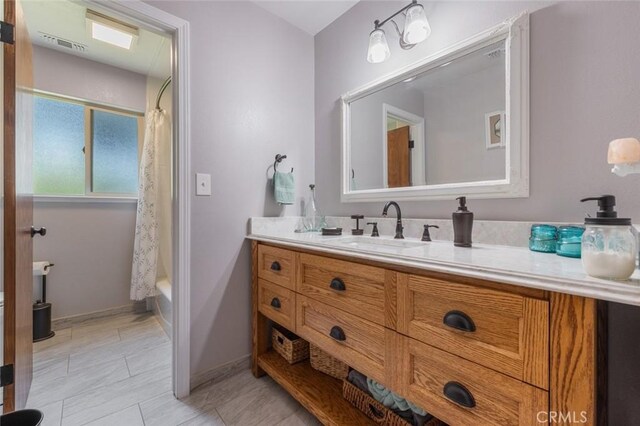 4742 Crow Rd, Oakdale, CA 95361 - bathroom featuring vanity and shower / bathtub combination with curtain