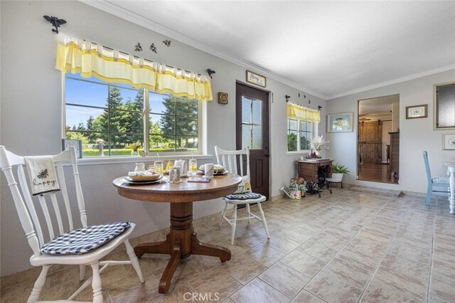 4742 Crow Rd, Oakdale, CA 95361 - dining space featuring crown molding