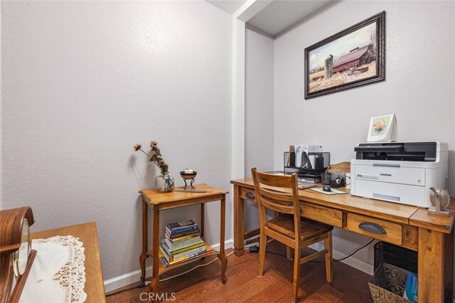 4742 Crow Rd, Oakdale, CA 95361 - office area featuring wood finished floors and baseboards