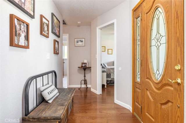 4742 Crow Rd, Oakdale, CA 95361 - entrance foyer with wood finished floors and a textured ceiling