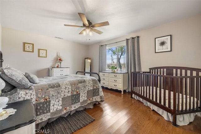 4742 Crow Rd, Oakdale, CA 95361 - bedroom with wood finished floors and ceiling fan