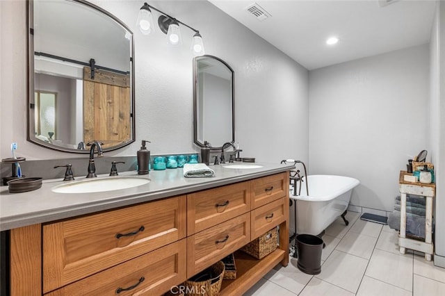 4742 Crow Rd, Oakdale, CA 95361 - bathroom with double vanity, a freestanding bath, and tile patterned floors
