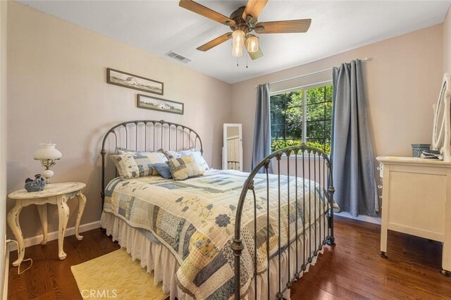 4742 Crow Rd, Oakdale, CA 95361 - bedroom featuring wood finished floors and a ceiling fan
