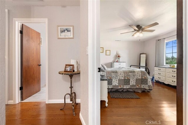 4742 Crow Rd, Oakdale, CA 95361 - bedroom featuring wood finished floors and ceiling fan