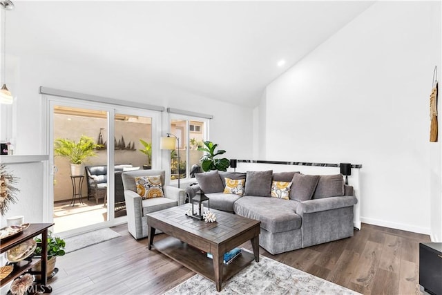 2 Daytona Unit 129, Laguna Niguel, CA 92677 - living area with vaulted ceiling, wood finished floors, and recessed lighting