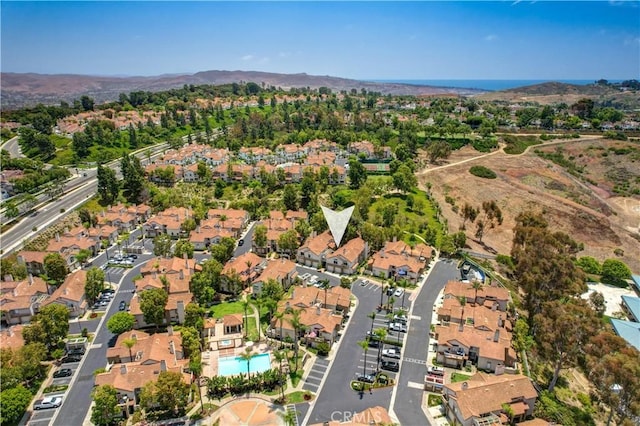 2 Daytona Unit 129, Laguna Niguel, CA 92677 - aerial overview of property's location with nearby suburban area and a mountainous background