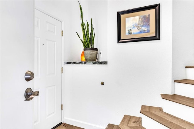 2 Daytona Unit 129, Laguna Niguel, CA 92677 - entryway featuring stairway and baseboards