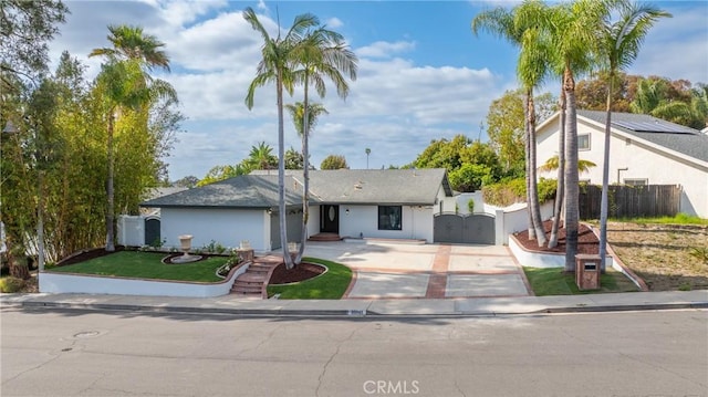 25981 Cordillera Dr, Mission Viejo, CA 92691 - ranch-style house with concrete driveway and a gate