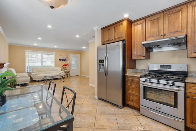 4943 Bresee Ave, Baldwin Park, CA 91706 - kitchen with appliances with stainless steel finishes, under cabinet range hood, ornamental molding, brown cabinetry, and open floor plan