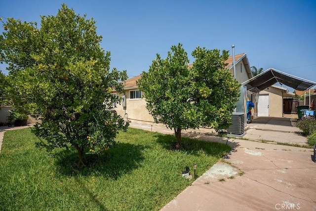 4943 Bresee Ave, Baldwin Park, CA 91706 - view of side of property with stucco siding and a central AC unit