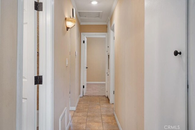 4943 Bresee Ave, Baldwin Park, CA 91706 - corridor with crown molding, light stone finish flooring, and attic access