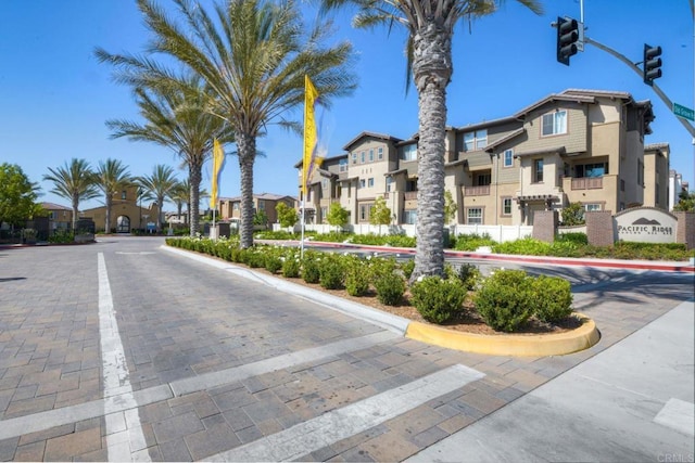 1201 Via Lucero, Oceanside, CA 92056 - view of street with a residential view, traffic lights, and curbs