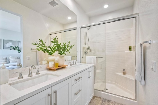 1201 Via Lucero, Oceanside, CA 92056 - bathroom featuring double vanity, a shower stall, and recessed lighting