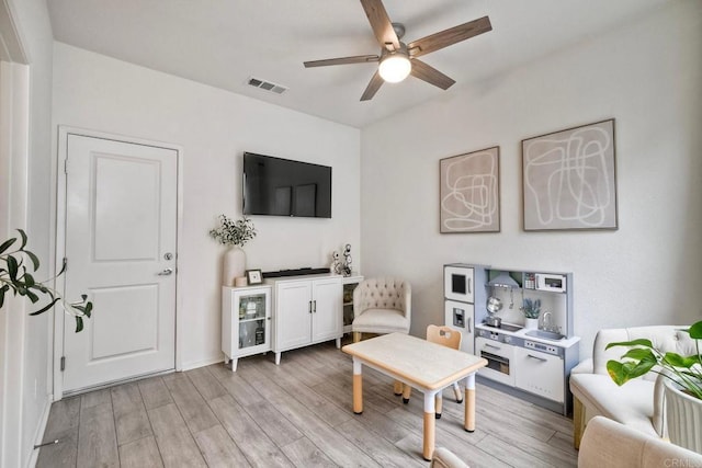 1201 Via Lucero, Oceanside, CA 92056 - living room featuring ceiling fan and light wood-type flooring