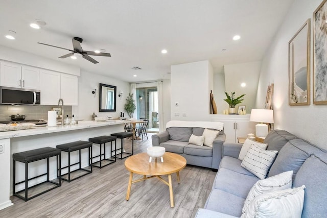 1201 Via Lucero, Oceanside, CA 92056 - living area featuring light wood-type flooring, ceiling fan, and recessed lighting