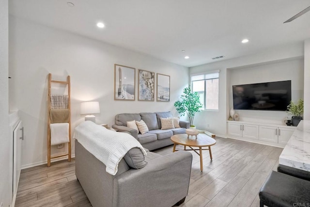 1201 Via Lucero, Oceanside, CA 92056 - living room with light wood-style floors and recessed lighting