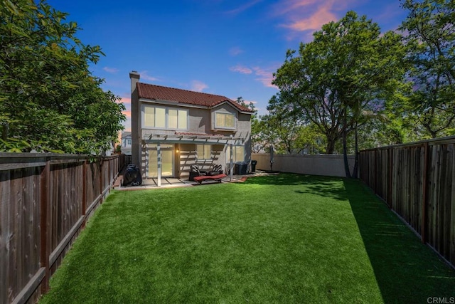 2435 Bear Rock, Escondido, CA 92026 - back of house with a tile roof, stucco siding, a fenced backyard, a pergola, and a chimney