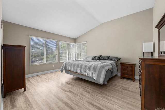 2435 Bear Rock, Escondido, CA 92026 - bedroom featuring light wood-type flooring and lofted ceiling