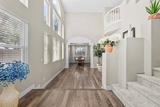 2435 Bear Rock, Escondido, CA 92026 - entryway featuring a high ceiling, wood finished floors, stairway, and a chandelier
