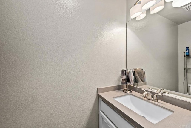 2435 Bear Rock, Escondido, CA 92026 - bathroom with vanity and a textured wall