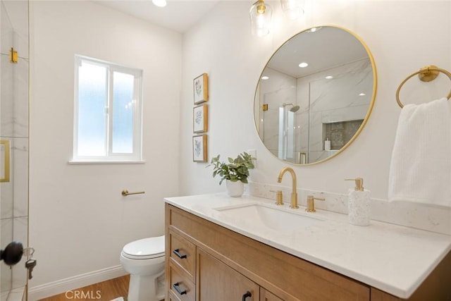 6118 Wolfe St, Lakewood, CA 90713 - full bath featuring vanity, a marble finish shower, and wood finished floors