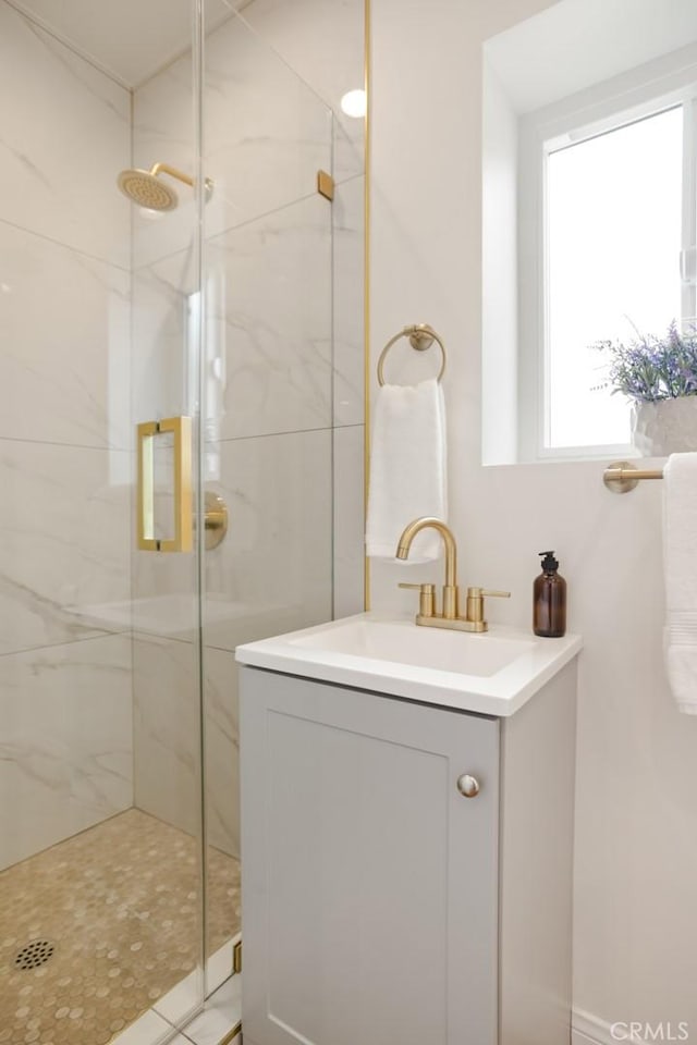 6118 Wolfe St, Lakewood, CA 90713 - full bath with a marble finish shower and vanity