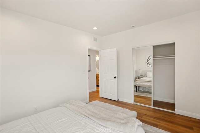 6118 Wolfe St, Lakewood, CA 90713 - bedroom featuring wood finished floors, a closet, and recessed lighting