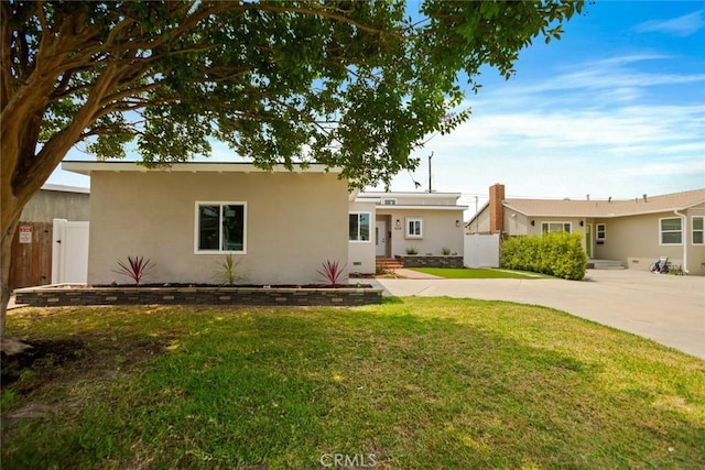 6118 Wolfe St, Lakewood, CA 90713 - view of front of house featuring stucco siding and entry steps