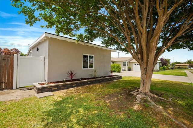6118 Wolfe St, Lakewood, CA 90713 - view of property exterior with stucco siding