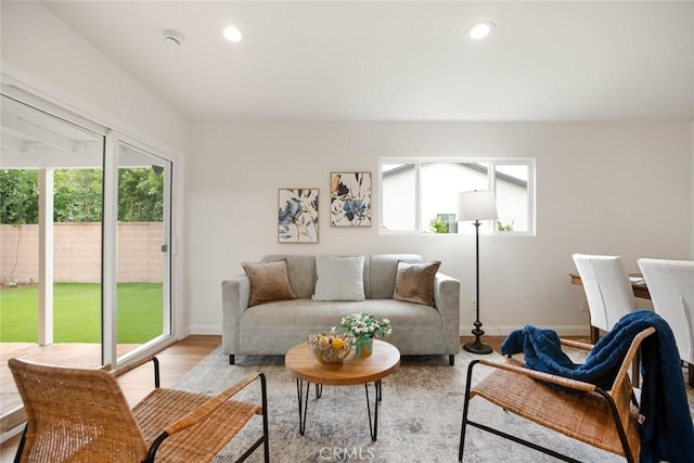 6118 Wolfe St, Lakewood, CA 90713 - living area with plenty of natural light, recessed lighting, and light wood-style flooring