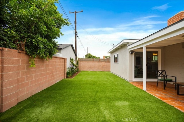 6118 Wolfe St, Lakewood, CA 90713 - fenced yard with a patio