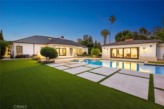 300 W Las Flores Ave, Arcadia, CA 91007 - view of swimming pool featuring a patio area, a lawn, an exterior structure, an outdoor structure, and a pool with connected hot tub