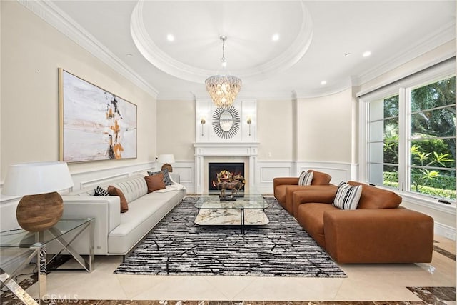 300 W Las Flores Ave, Arcadia, CA 91007 - living area with ornamental molding, a decorative wall, a raised ceiling, a wainscoted wall, and a warm lit fireplace