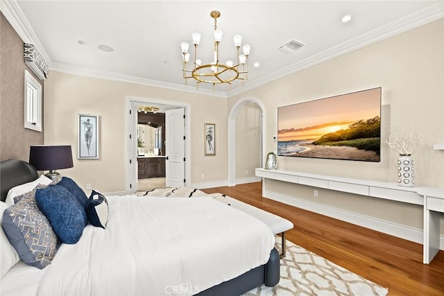 300 W Las Flores Ave, Arcadia, CA 91007 - bedroom featuring wood finished floors, a chandelier, ornamental molding, arched walkways, and ensuite bathroom