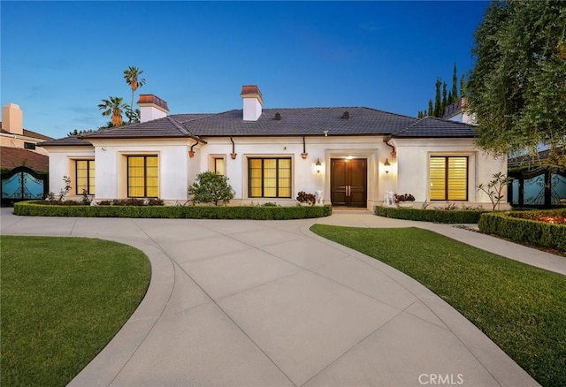 300 W Las Flores Ave, Arcadia, CA 91007 - view of front of home featuring a front yard, stucco siding, and a chimney