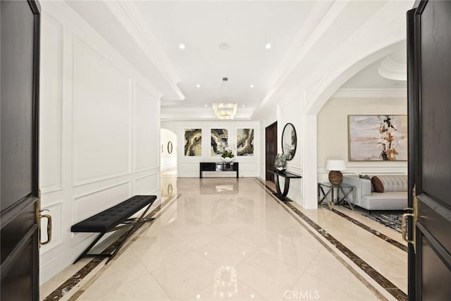 300 W Las Flores Ave, Arcadia, CA 91007 - hall featuring ornamental molding, arched walkways, a decorative wall, a chandelier, and recessed lighting