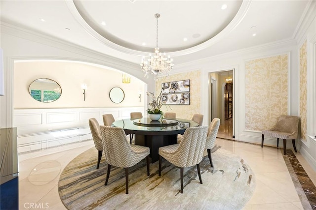 300 W Las Flores Ave, Arcadia, CA 91007 - dining room with inlaid floor details, a chandelier, crown molding, a tray ceiling, and a decorative wall