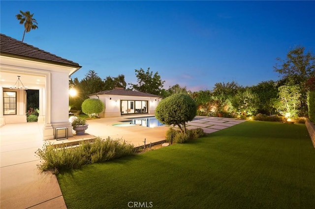 300 W Las Flores Ave, Arcadia, CA 91007 - view of grassy yard featuring a patio, a storage structure, an outbuilding, and an outdoor pool