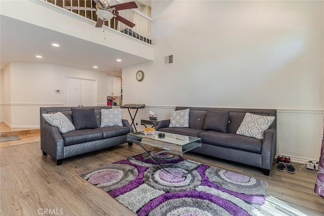 38342 5th Pl W, Palmdale, CA 93551 - living room with wood finished floors, a ceiling fan, and recessed lighting