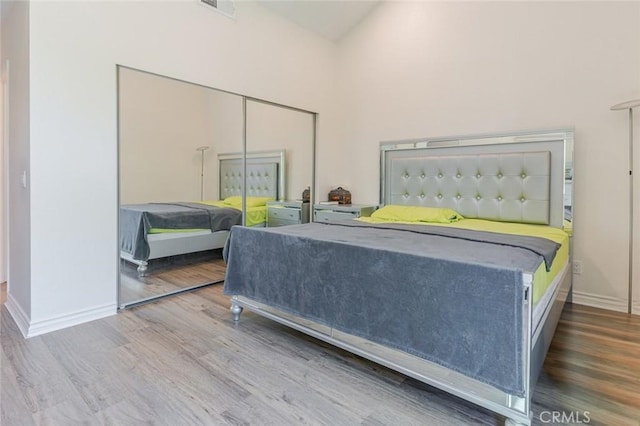 38342 5th Pl W, Palmdale, CA 93551 - bedroom with wood finished floors and a closet