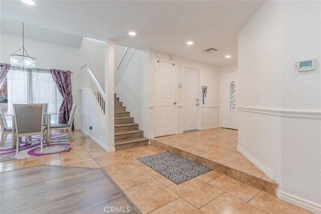 38342 5th Pl W, Palmdale, CA 93551 - tiled foyer entrance featuring a chandelier, stairway, and recessed lighting