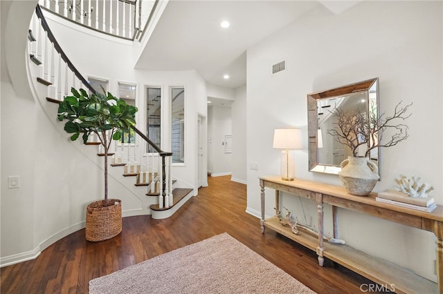 520 Kings Rd, Newport Beach, CA 92663 - foyer entrance featuring stairs, wood finished floors, recessed lighting, and a towering ceiling