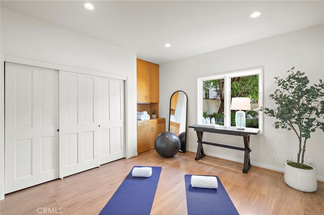 520 Kings Rd, Newport Beach, CA 92663 - workout room with light wood finished floors and recessed lighting