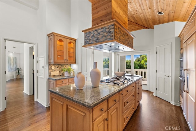 520 Kings Rd, Newport Beach, CA 92663 - kitchen with stainless steel gas stovetop, high vaulted ceiling, dark wood-style floors, a kitchen island, and wooden ceiling