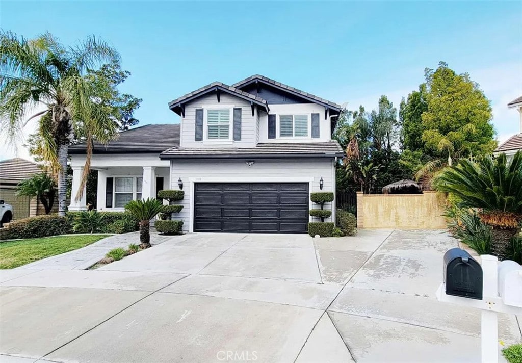 11362 Windhaven Ct, Rancho Cucamonga, CA 91701 - view of front facade with an attached garage, concrete driveway, and a tile roof