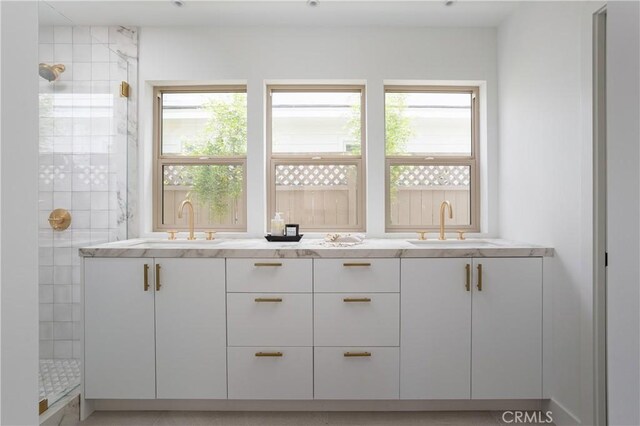 212 E 19th St, Costa Mesa, CA 92627 - bathroom with healthy amount of natural light, a stall shower, and double vanity