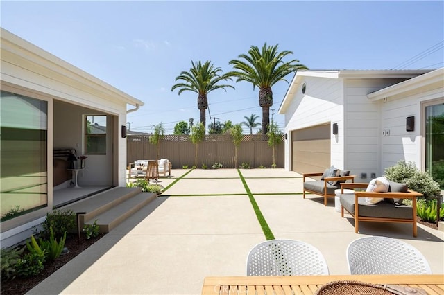 212 E 19th St, Costa Mesa, CA 92627 - view of patio featuring an attached garage