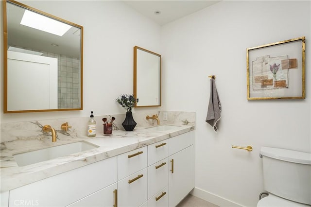 212 E 19th St, Costa Mesa, CA 92627 - bathroom with double vanity and toilet