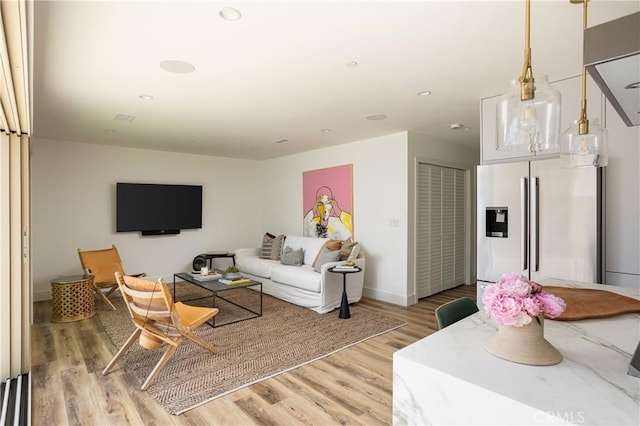 212 E 19th St, Costa Mesa, CA 92627 - living room featuring light wood-type flooring and recessed lighting