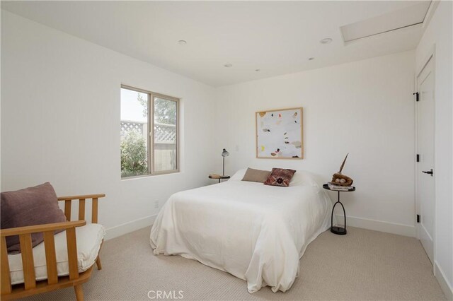 212 E 19th St, Costa Mesa, CA 92627 - carpeted bedroom with baseboards and attic access